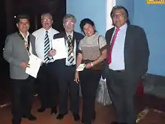 Sonia Bermudes y los homenajeados