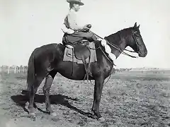 757px-StateLibQld_1_255100_Woman_on_horseback_carrying_emu_eggs,_Blackall_district,_1908