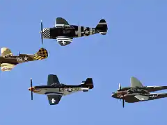 P-40-Warhawk-P-51-Mustang-P-47-Thunderbolt-P-38-Lightning-fly-in-formation