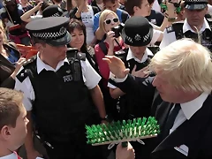 boris-johnson-talks-with-a-cleanup-volunteer-holding-a-broom-pic-ap-632859928 boris-johnson-talks-with-a-cleanup-volunteer-holding-a-broom-pic-ap-632859928