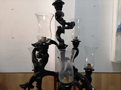 Candelabro guardabrisa