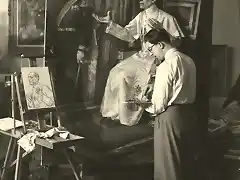 Dutch painter Wim van de Plas working on a portrait of Pope Pius XII in 1950.