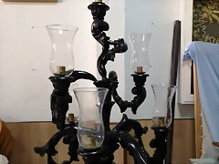 Candelabro guardabrisa