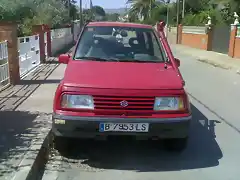 el coche por delante